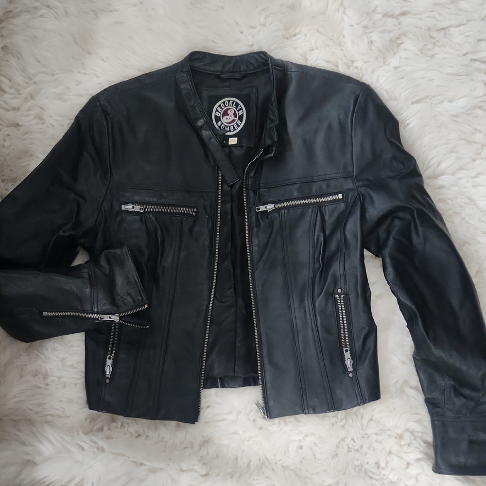 Black Leather Jacket with Zipper Details